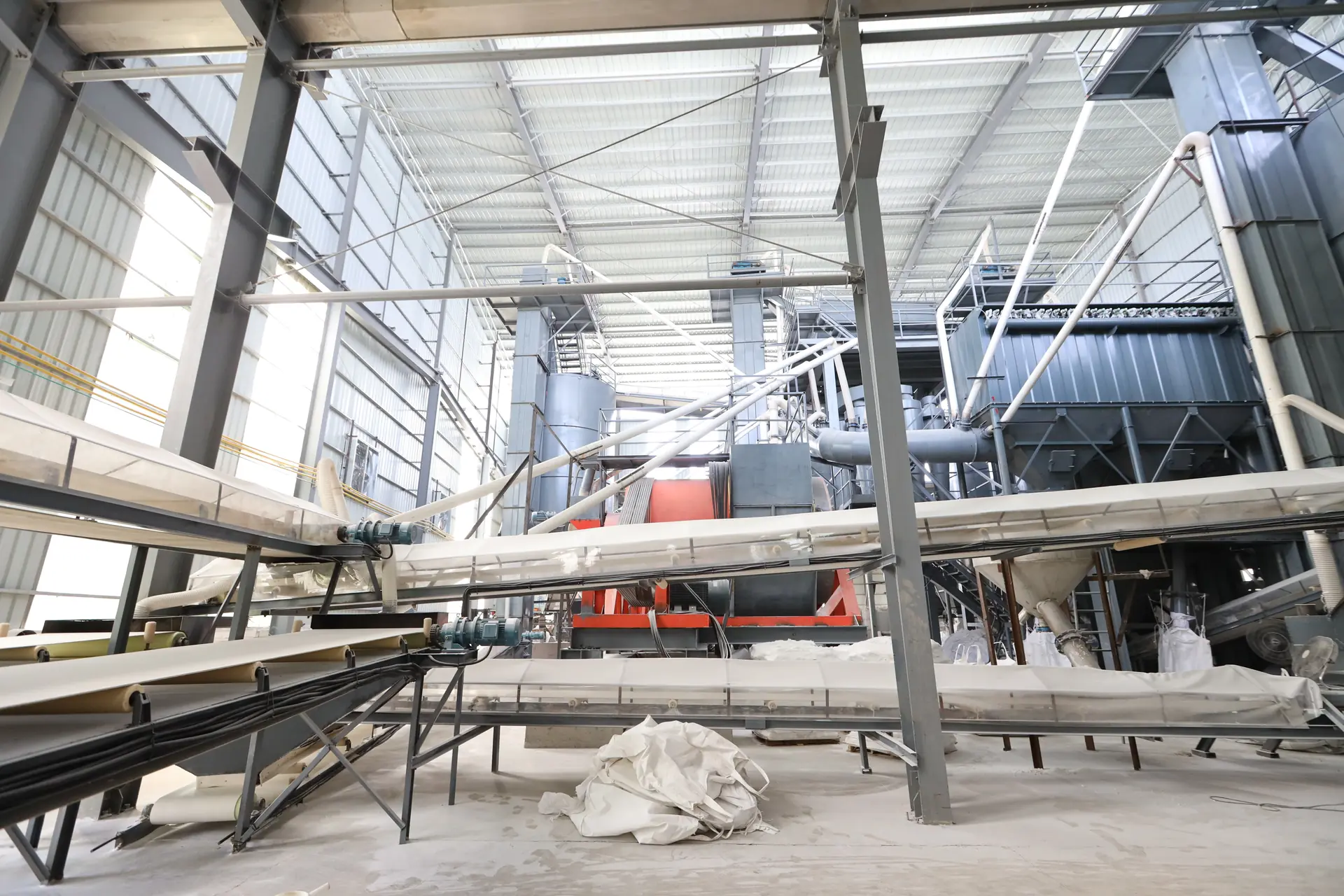 Production workshop with conveyors, pipework and equipment